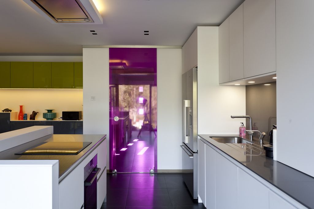 Base bottom roller system Belans installed on a glass door at a private kitchen